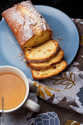 fresh raisin muffin and cup of tea