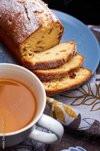 fresh raisin muffin and cup of tea