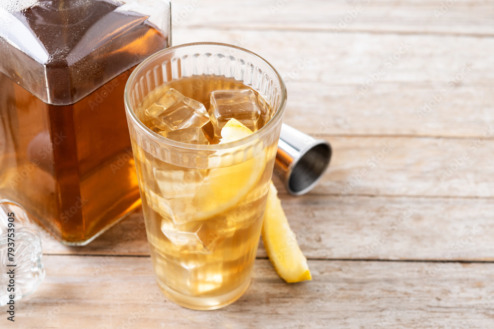 Highball, Whiskey with soda and lemon beverage on wooden table. Copy space Highball, Whiskey with soda and lemon beverage on wooden table. Copy space