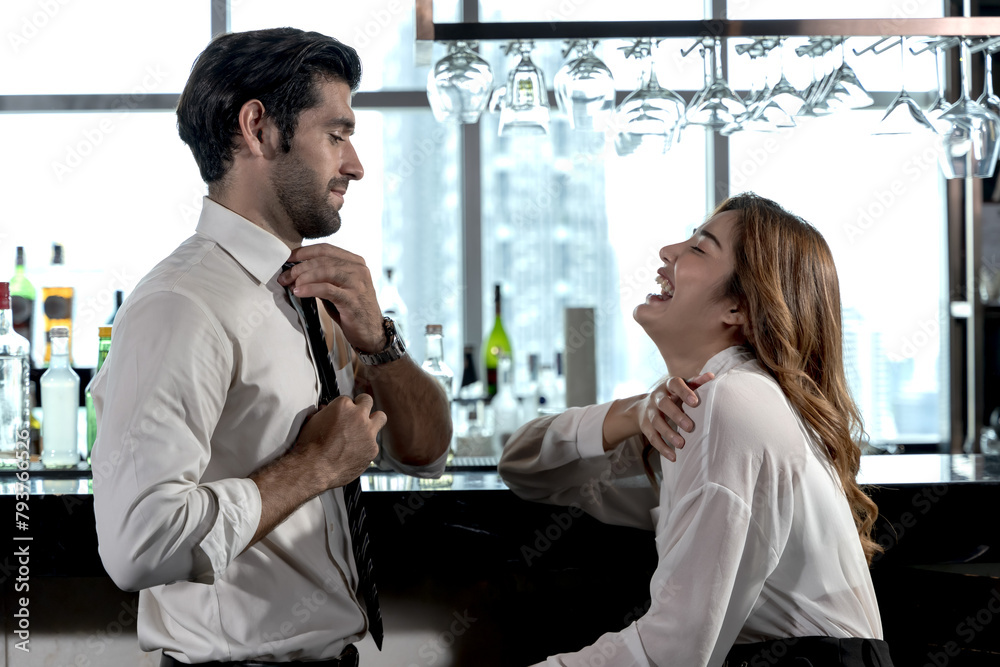 Obraz premium Young sweet couples having a good time in night club bar