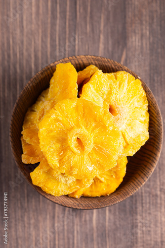 Dried pineapple in a bowl. Dried fruits. 