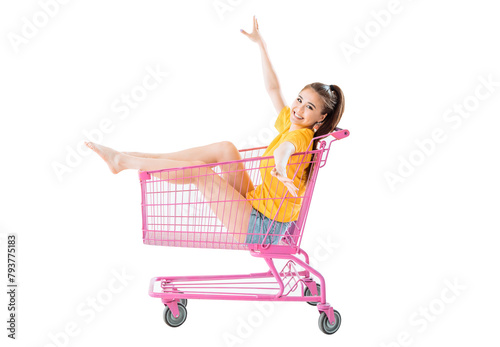 Shopping cart isolated on white with a beautiful happy young woman in it. Great object to put on a website or banner for an online store or supermarket. Ready for clipping path.