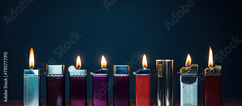 Different lighters in various colors and sizes photo