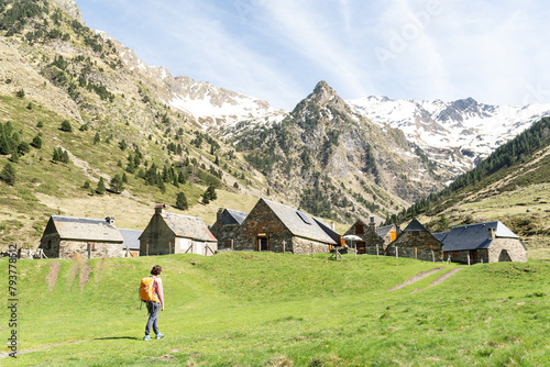 Woman hiking in the vicinity of Les granges du Moudang in French Pyrenees.