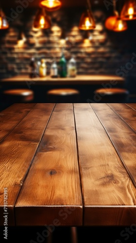 b Close-up of an empty wooden table with a blurred background of a bar 