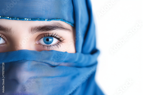 Close up Muslim woman with blue eyes portrait isolated on white background