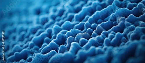 Blue spongy texture with numerous tiny pores photo