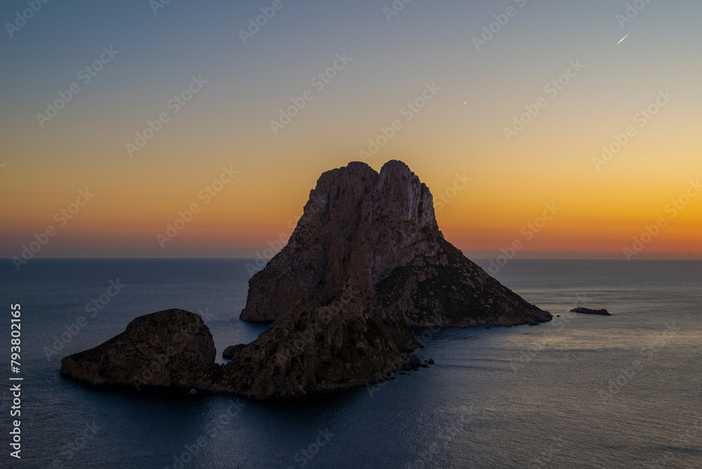 Es Vedra and the smallest Es Vendrell at sunset, Sant Josep de Sa Talaia, Ibiza, Balearic Islands, Spain Es Vedra and the smallest Es Vendrell at sunset, Sant Josep de Sa Talaia, Ibiza, Balearic Islands, Spain