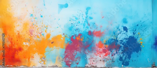 Colorful graffiti wall splattered with paint photo