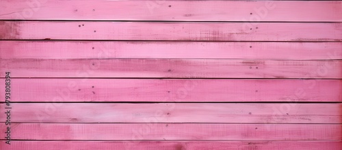 Pink wooden wall close-up in black frame