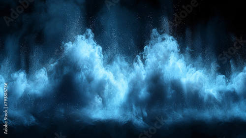 The image is of a large blue cloud of smoke or steam, with a dark background. The smoke is billowing and swirling, creating a sense of movement and energy. Scene is one of excitement and wonder