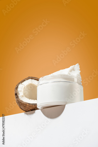 Packaging for cosmetics pump bottles without logo and label. A bottle of coconut-scented body cream