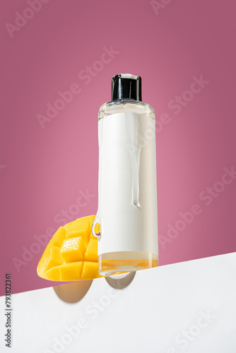 Packaging for cosmetics pump bottles without logo and label. Mango-scented shampoo Bottle