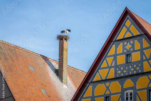 roof of an old house at the ancient town of dinkelsbühl germany with stork on the chimney © Reinhard
