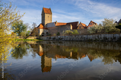 Old city wall with tower of the ancient town of dinkelsbühl germany with reflection in the river water © Reinhard