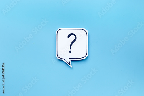Ask concept. Question mark on paper speech bubble, top view © 9dreamstudio