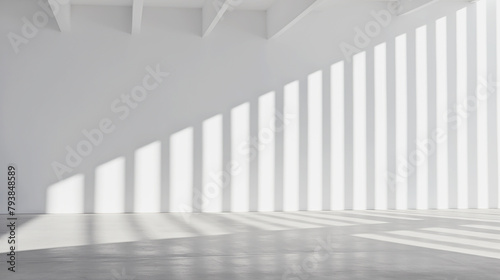 Large and tall room with white walls and shadows.