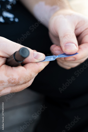 Men checking their sugar levels using a glucometer