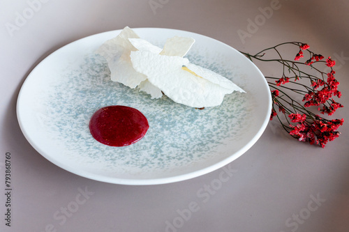 Elegant vegetable pâté with vibrant beetroot coulis and fresh herbs, plated artistically. Culinary excellence with a modern twist. (ID: 793868760)