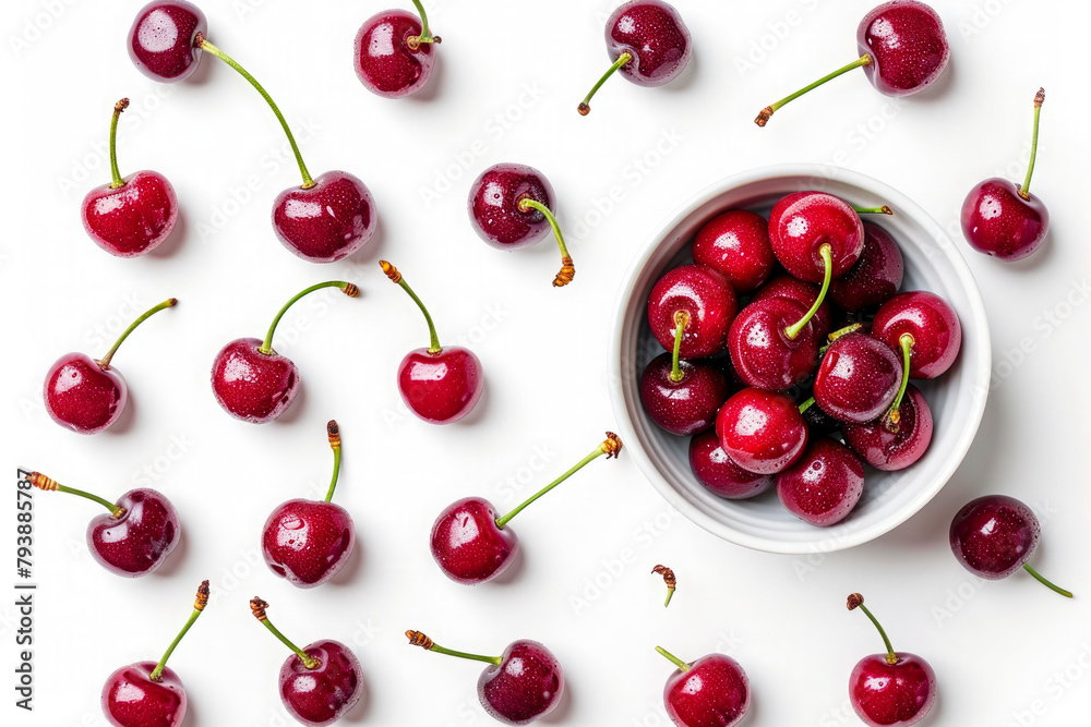 Set of ripe red cherries in a bowl cut out on white background Set of ripe red cherries in a bowl cut out on white background