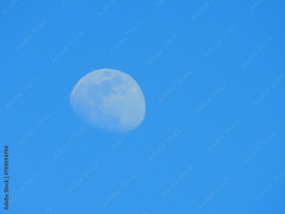 full moon on a blue sky background full moon on a blue sky background