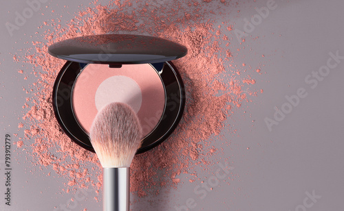 Round pink blusher and crashed eyeshadow for make up. with space for text. Sample of cosmetic product