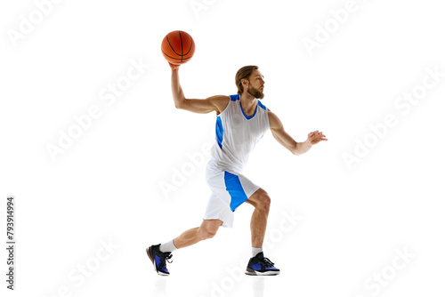 Young man, enthusiastic basketball player inn motion with ball, preparing for upcoming game,training isolated on white background. Concept of sport, competition, active and healthy lifestyle, game © master1305