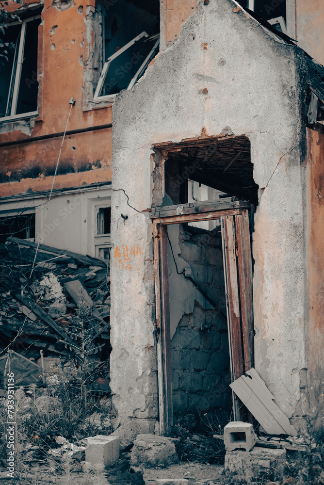 old broken door of a destroyed house in Ukraine old broken door of a destroyed house in Ukraine
