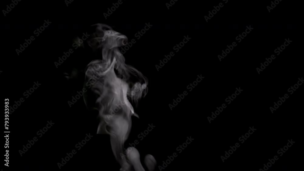 Steam Rises From the Cup. White smoke on black background. Motion at a rate of 240 fps