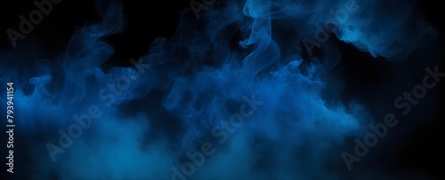 Abstract blue smoke on black background. Swirling shapes in obscurity.