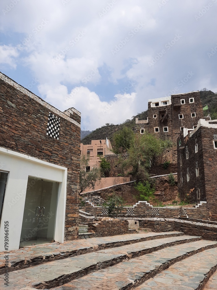 Obraz premium Beautiful daytime view of Rijal Almaa heritage village in Asir region in Saudi Arabia. 