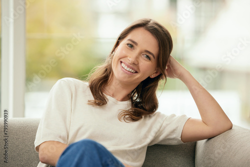 Φωτογραφία Portrait, smile and woman on sofa in home living room for relax, calm and peace in apartment in Switzerland