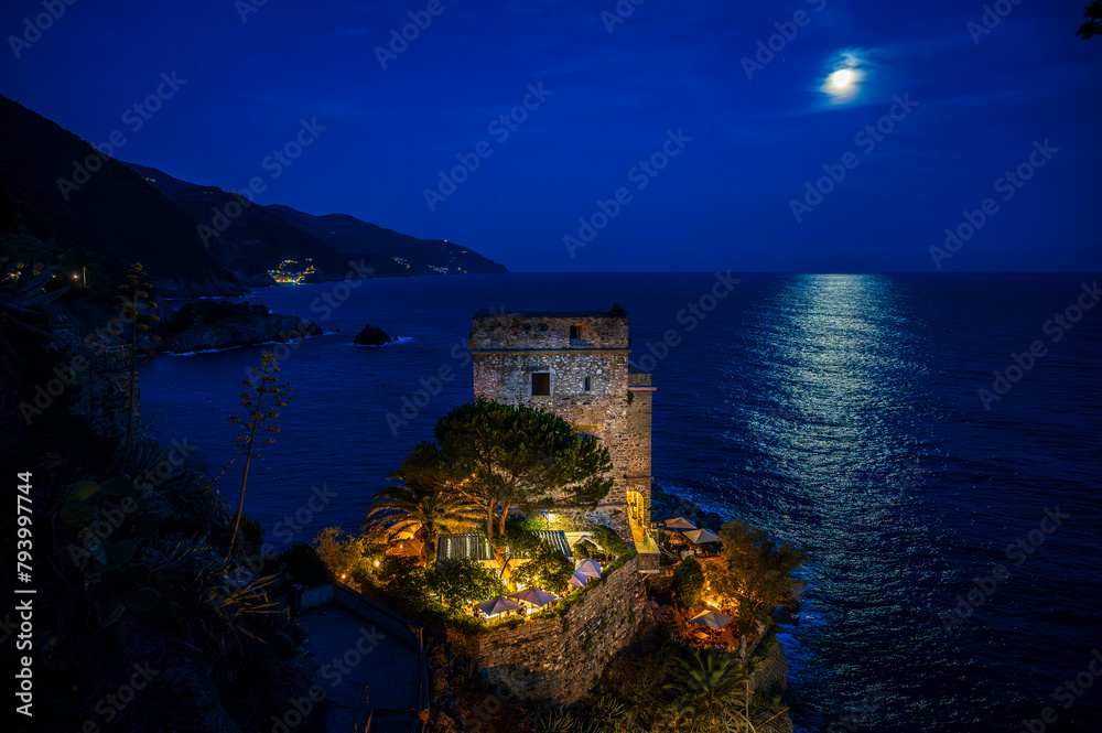 Magic of the Cinque Terre. Timeless images. Monterosso, the port, the beach and the ancient village at dusk