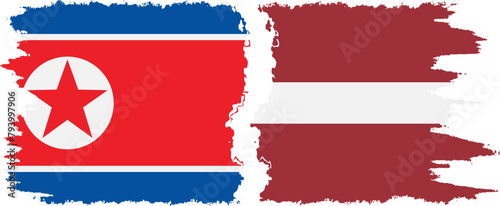 Latvia and North Korea grunge flags connection vector