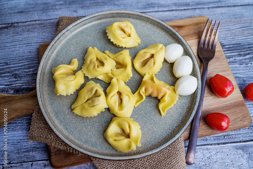 Ravioli with mozzarella and tomato Ravioli with mozzarella and tomato