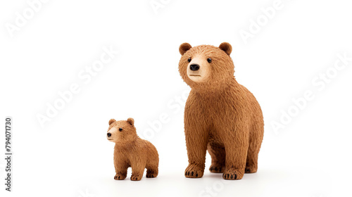 brown bear toy with mother and child separated against a stark white background © drizzlingstarsstudio