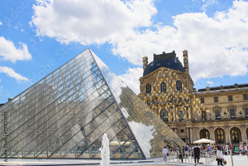 View of the Louvre Museum, the world's largest art museum and a historic monument in Paris, France, on a sunny day. photo