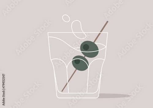 Elegant alcohol Glass With Twin Olives delicately perched on a toothpick