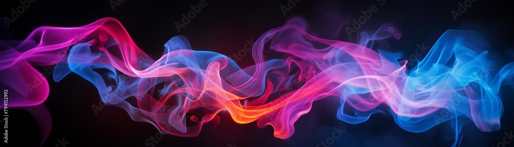 Colorful smoke flowing in the dark