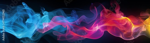 Colorful smoke flowing in the dark photo