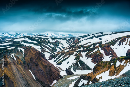 Volcanic mountain with snow covered at Blahnjukur trail in Icelandic Highlands photo