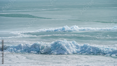 spring ice drift on the lake. ice hummocks