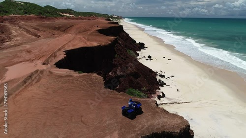 Aerial view of coastal cliffs in Minas Beach, Praia da Pipa - Tibau do Sul, Rio Grande do Norte, Brazil photo