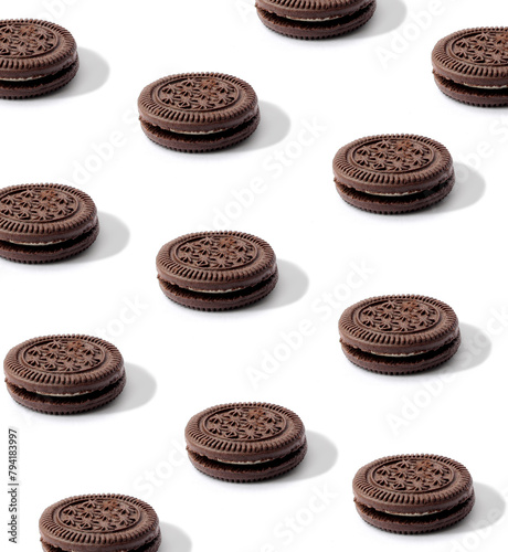 Creative layout made of chocolate cookies on the white background. Food concept. Macro concept. (ID: 794183997)