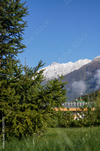 View of first snow in the mountains with a blue sky