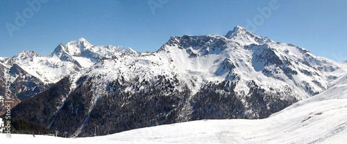 Panoramic view of the ski slopes of the famous La Plagne-Bellecote ski resort in the heart of the French Alps in the Tarentaise valley at the foot of Mont Blanc