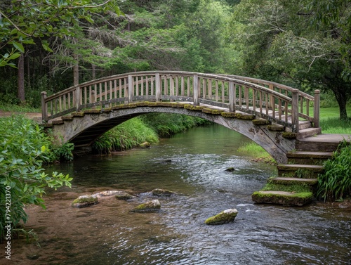 A bridge over a river with moss growing on it. The bridge is wooden and has steps leading up to it. The water is calm and clear, and the surrounding area is lush and green