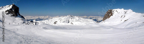 Panoramic view of the ski slopes of the famous La Plagne-Bellecote ski resort in the heart of the French Alps in the Tarentaise valley at the foot of Mont Blanc © Mariedofra