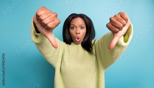 Photo of shocked impressed woman dressed sweater getting dislikes modern blue color background  photo