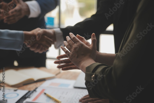 Meeting and greeting concept, Two confident Business handshake and business people after discussing good deal of Trading contract and new projects for both companies, success, partnership, co worker. photo